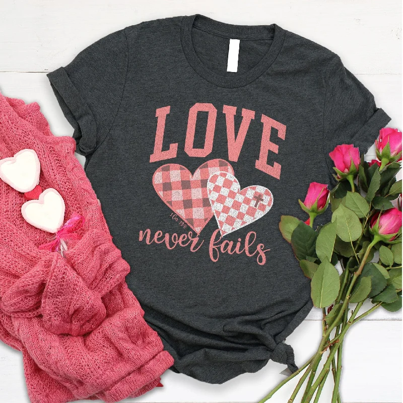 Chic Women's Outfit Limited Styles Love Never Fails Varsity Tee